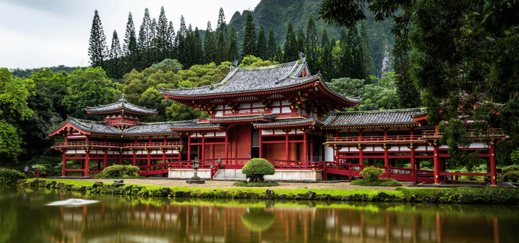 Photo of a red temple in Asia amidst a lush green mountains and clear lake.